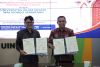 Penandatanganan MoU yang berlangsung di Gedung Rektorat UIN Walisongo Semarang, Ketua Bawaslu Jawa Tengah Muhammad Amin dan Rektor UIN Walisongo Prof. Dr. H. Musahadi, M.Ag.